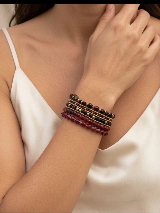 unbranded Jewelry - BOHO NWOT PLUM COLORED COIL BRACELET